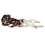 Guess glasses eyewear chain with leopard print fabric, featuring a white chain link and Guess branded charm