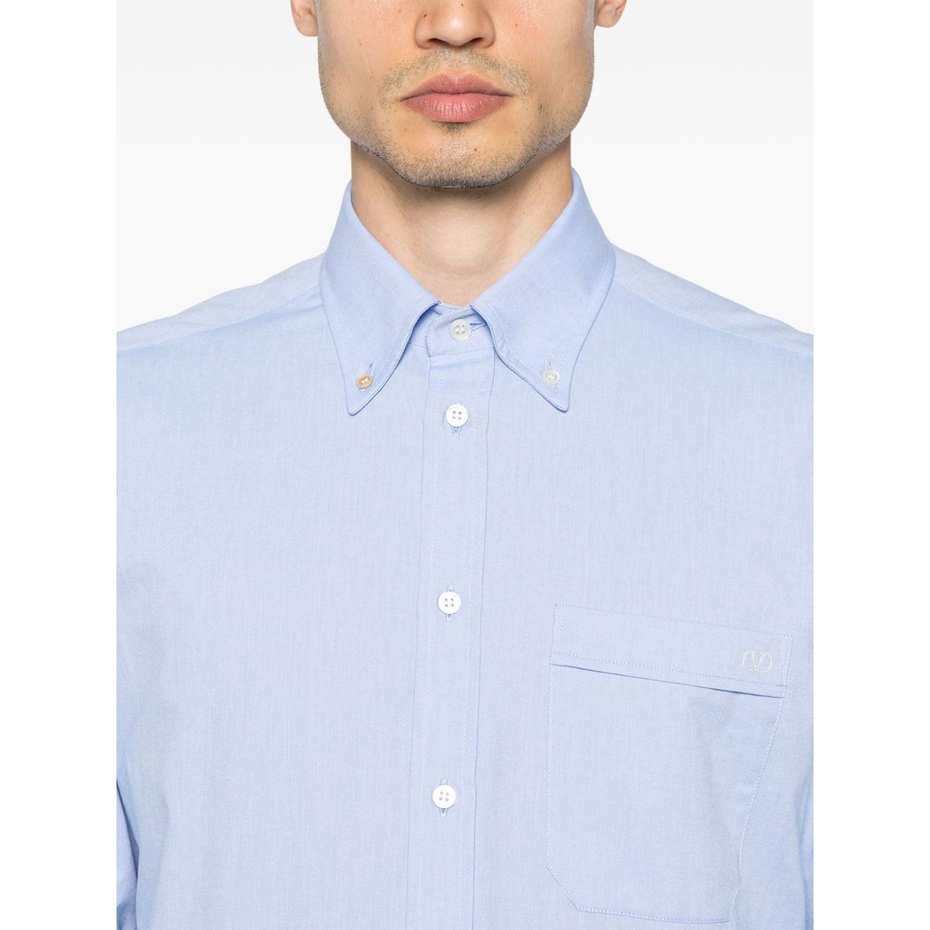 Valentino Formal Shirt with buttoned cuffs, chest patch pocket, and VLogo Signature in light blue cotton.