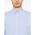 Valentino Formal Shirt with buttoned cuffs, chest patch pocket, and VLogo Signature in light blue cotton.