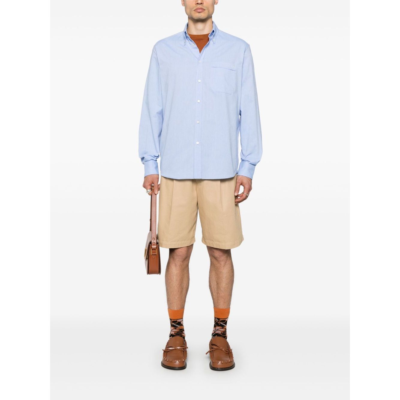 Valentino Formal Shirt with button-down collar, buttoned cuffs, and chest pocket showcased in a stylish ensemble.