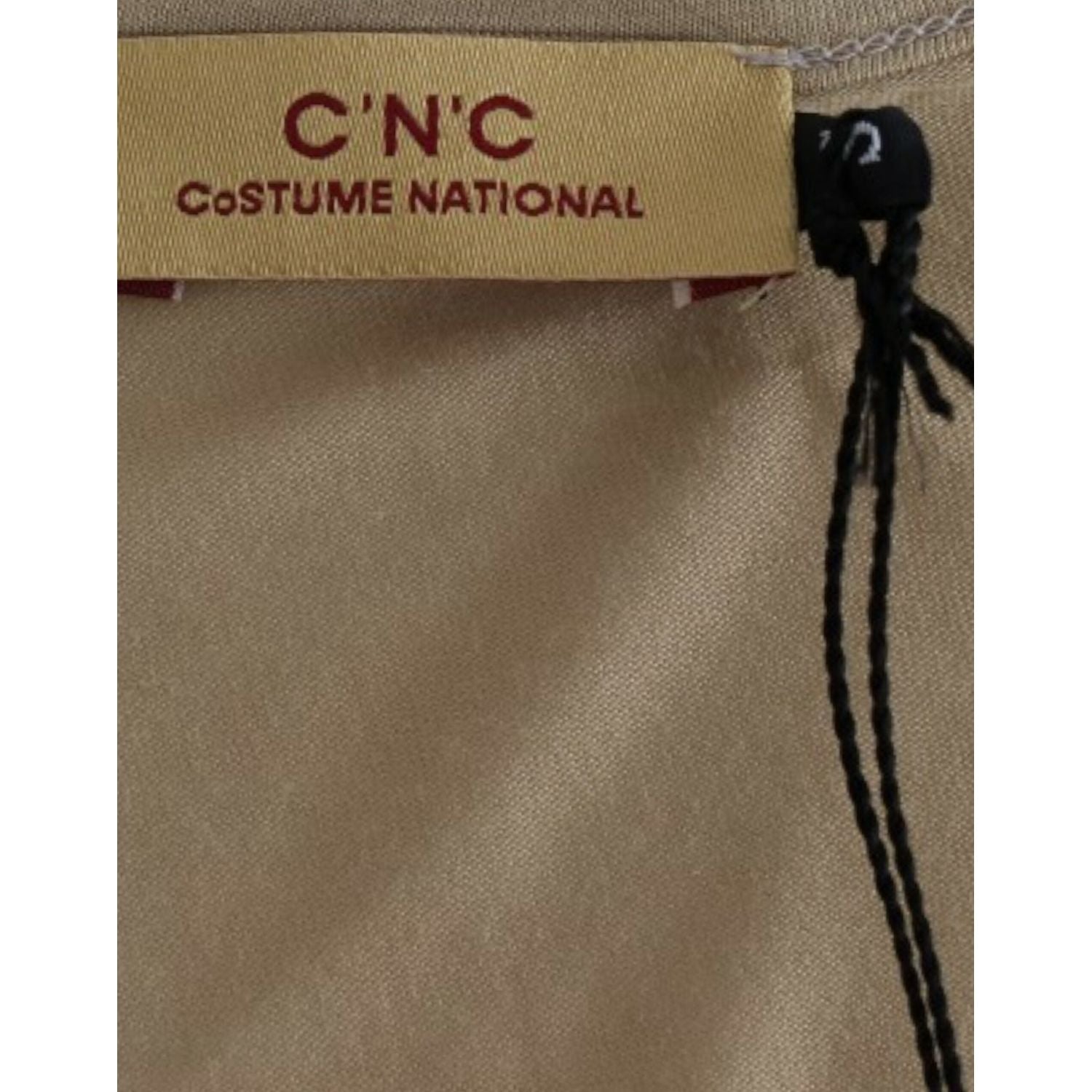 بلوزة تونك أنيقة بفتحة رقبة على شكل حرف V من مجموعة Costume National مع طبعة Motive