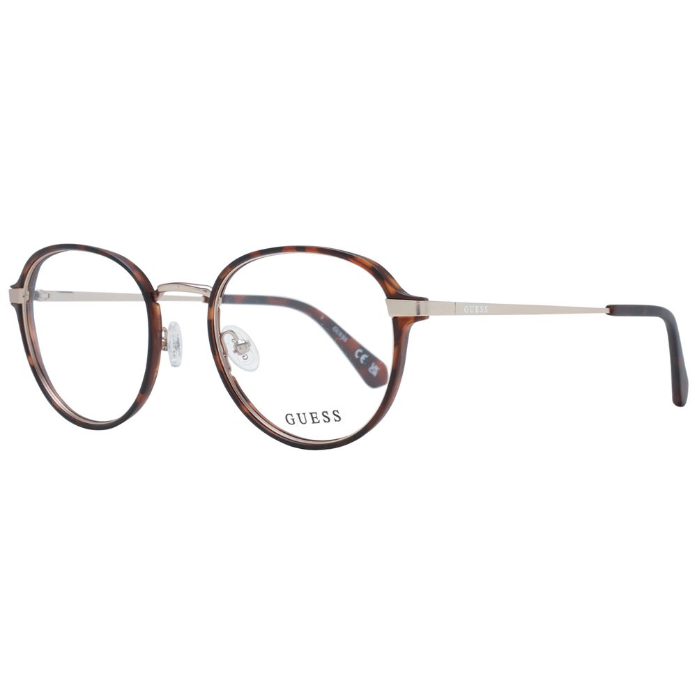 Tortoiseshell round Guess glasses frame with metallic temples and clear demo lenses, showcasing a modern and stylish eyewear design.