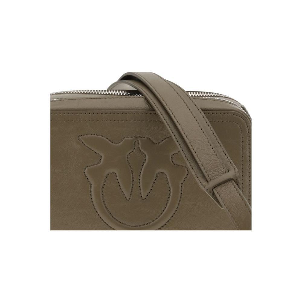 Front view with bag zipped and handles upright.