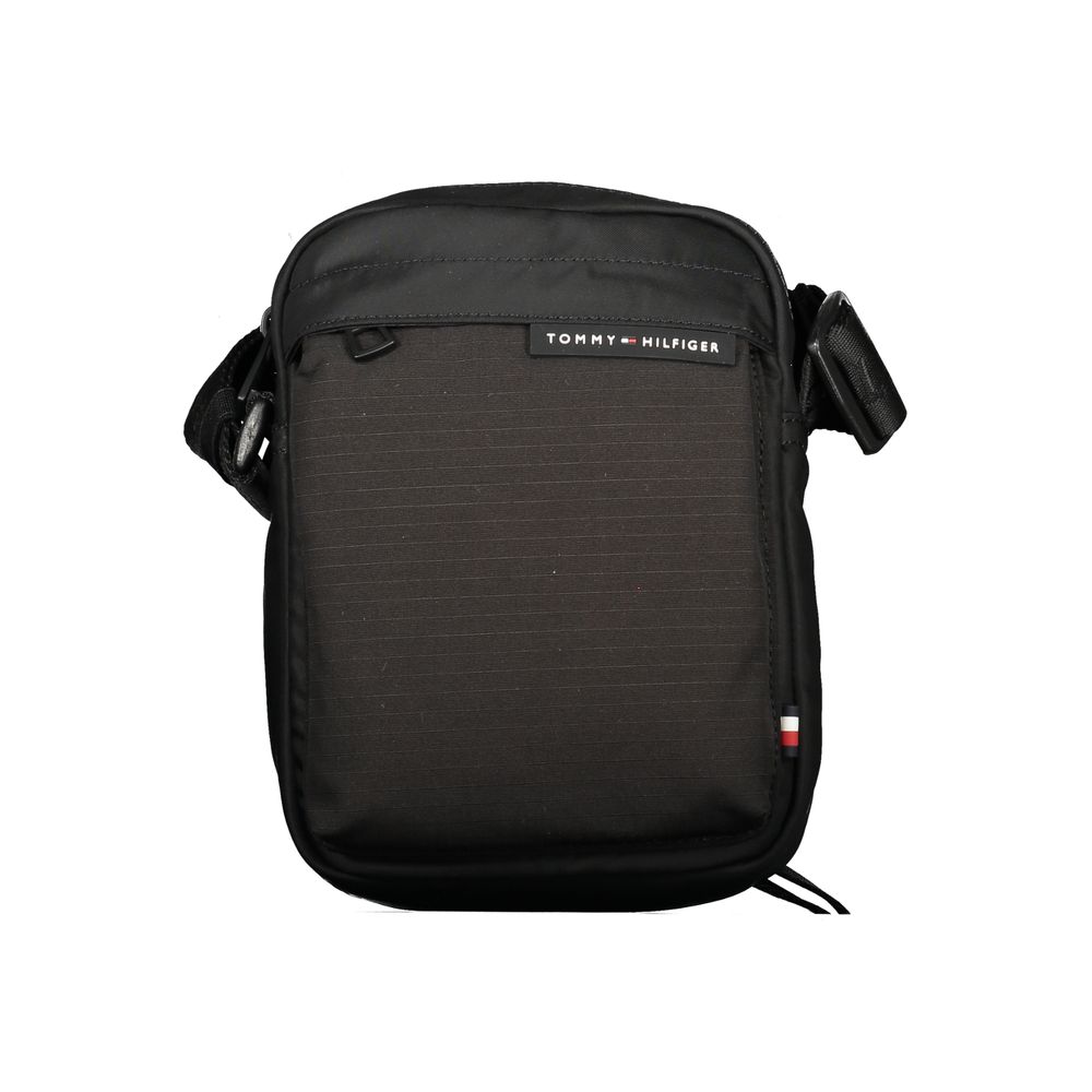 Front view with bag zipped and handles upright.