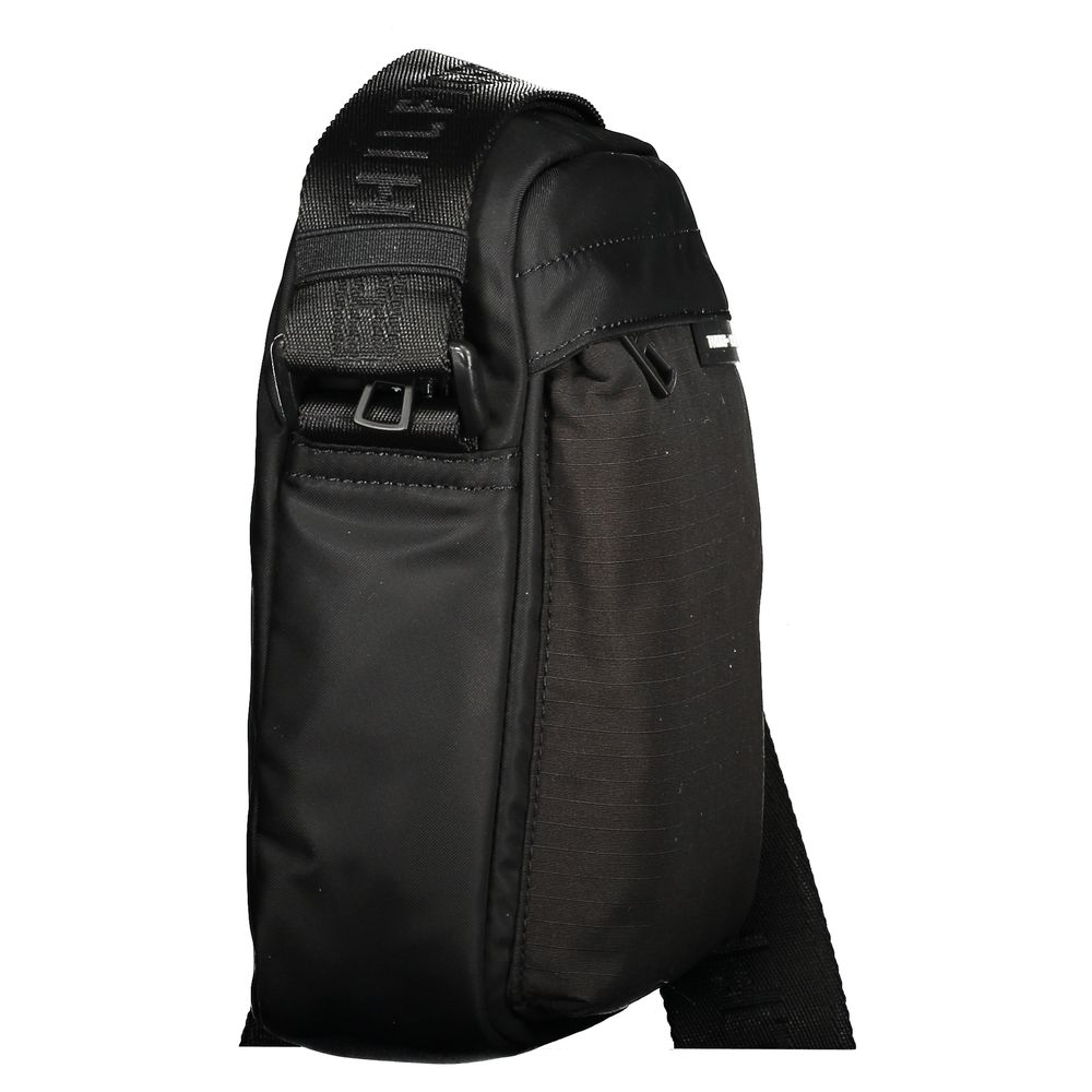 Front view with bag zipped and handles upright.