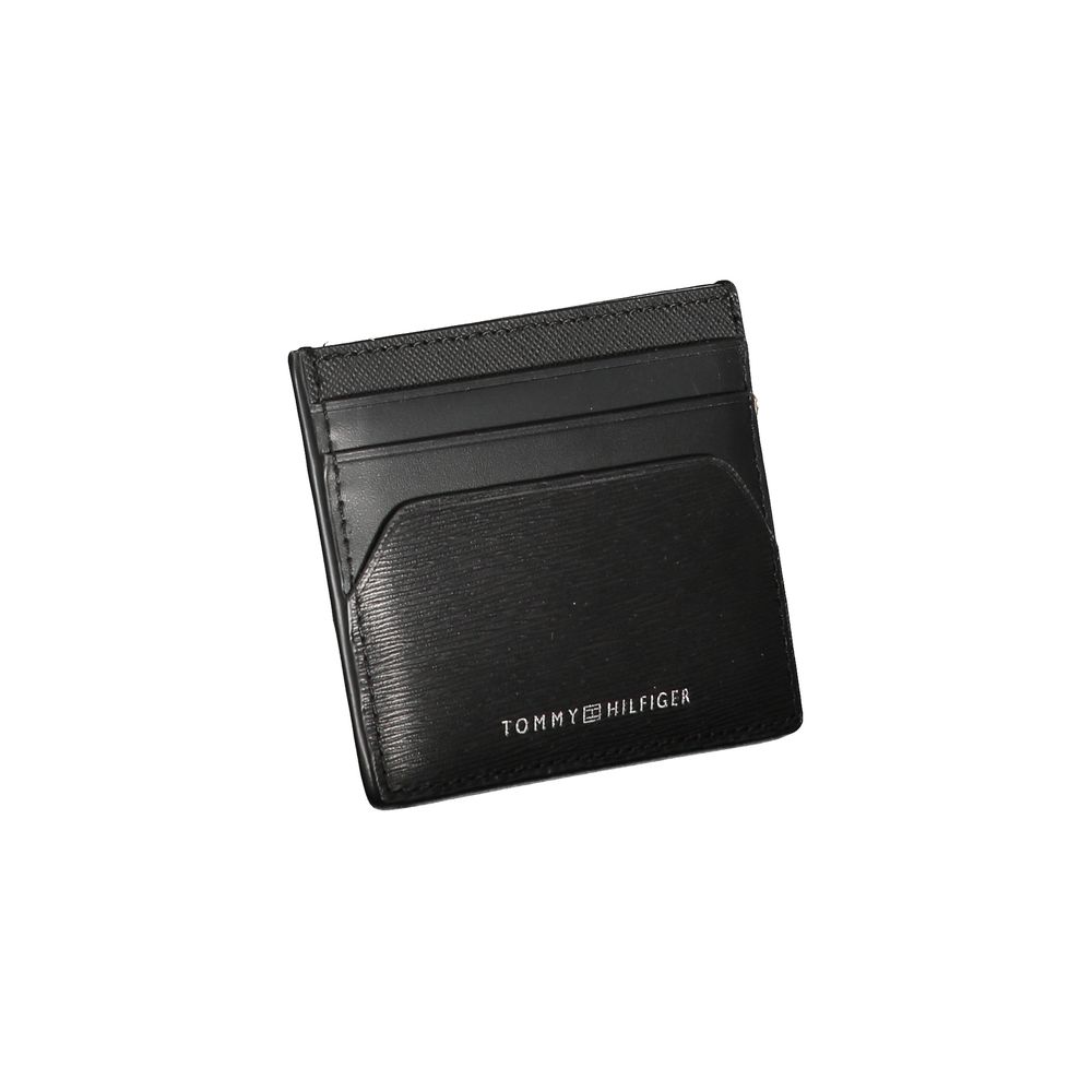 Tommy Hilfiger Black Leather Wallet with card holder and central pocket, featuring brand logo print.