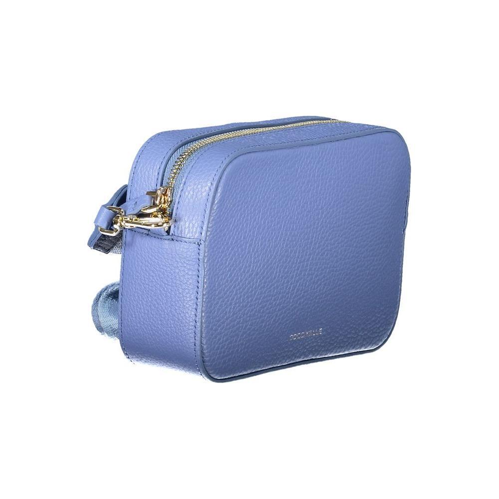 Front view with bag zipped and handles upright.