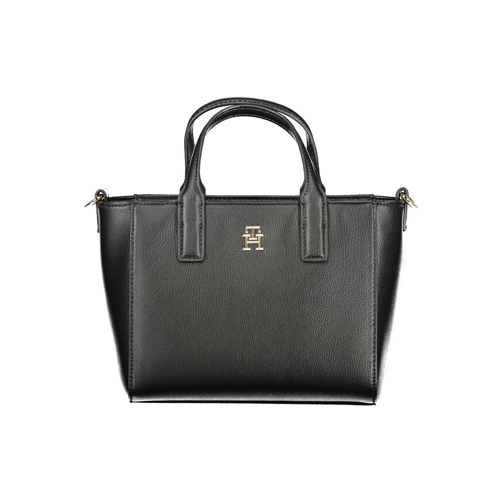 Front view with bag zipped and handles upright.