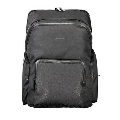 Calvin Klein Black Polyester Backpack with adjustable straps, laptop compartment, external pockets, zip closure, and logo detailing.