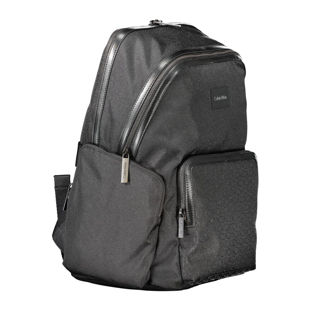 Calvin Klein Black Polyester Backpack with adjustable straps, multiple pockets, and laptop compartment. Made of 95% recycled polyester.