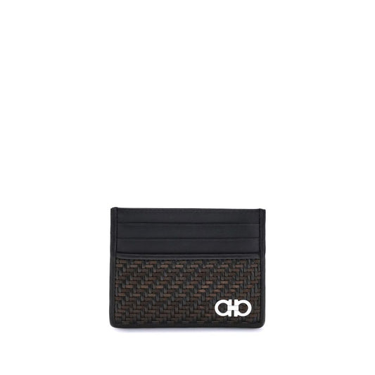 Ferragamo Black Calf Leather Bos Taurus Wallet with Gancini ornament and woven design.