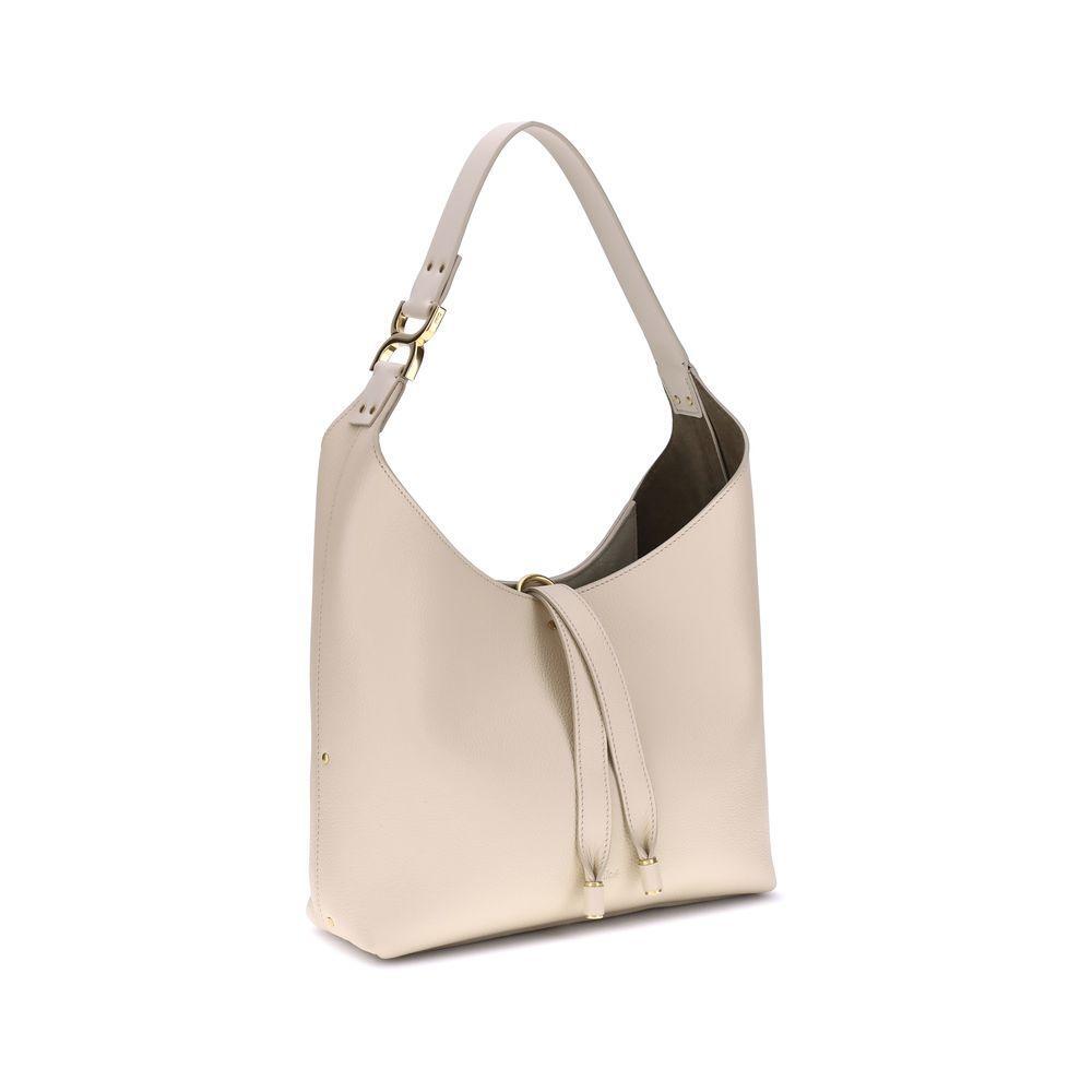 Front view with bag zipped and handles upright.