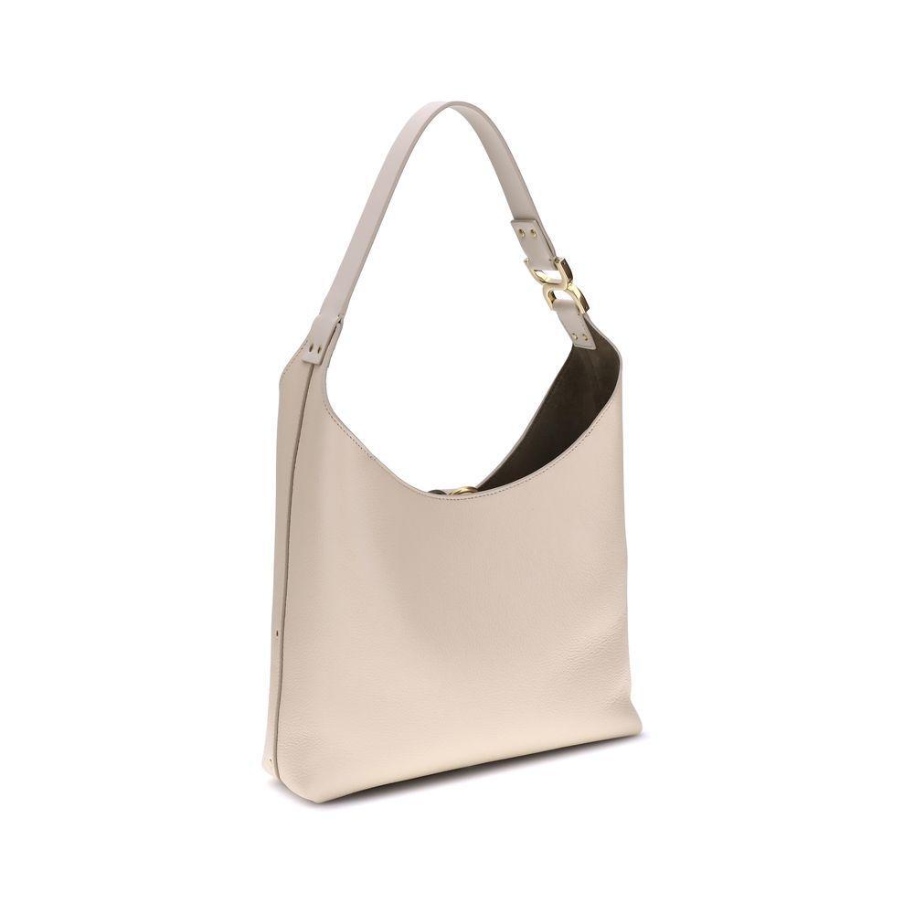 Front view with bag zipped and handles upright.