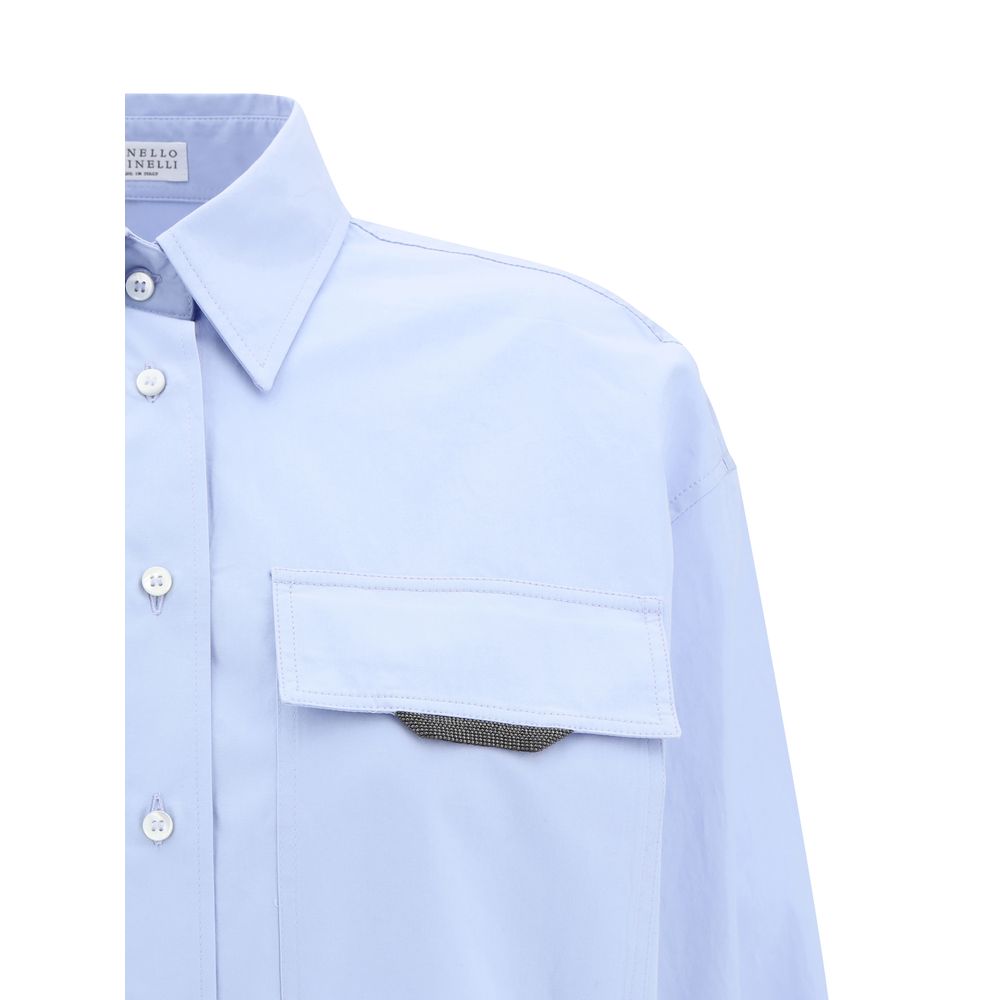 Brunello Cucinelli Light Blue Cotton Dress Shirt with classic collar and button closure, featuring jewel-embellished pocket for added luxury.