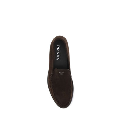 Prada Brown Calf Leather Bos Taurus Slip-On Loafers top view, elegant suede with logo and durable rubber sole, contemporary design.