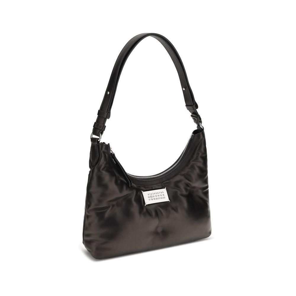Front view with bag zipped and handles upright.