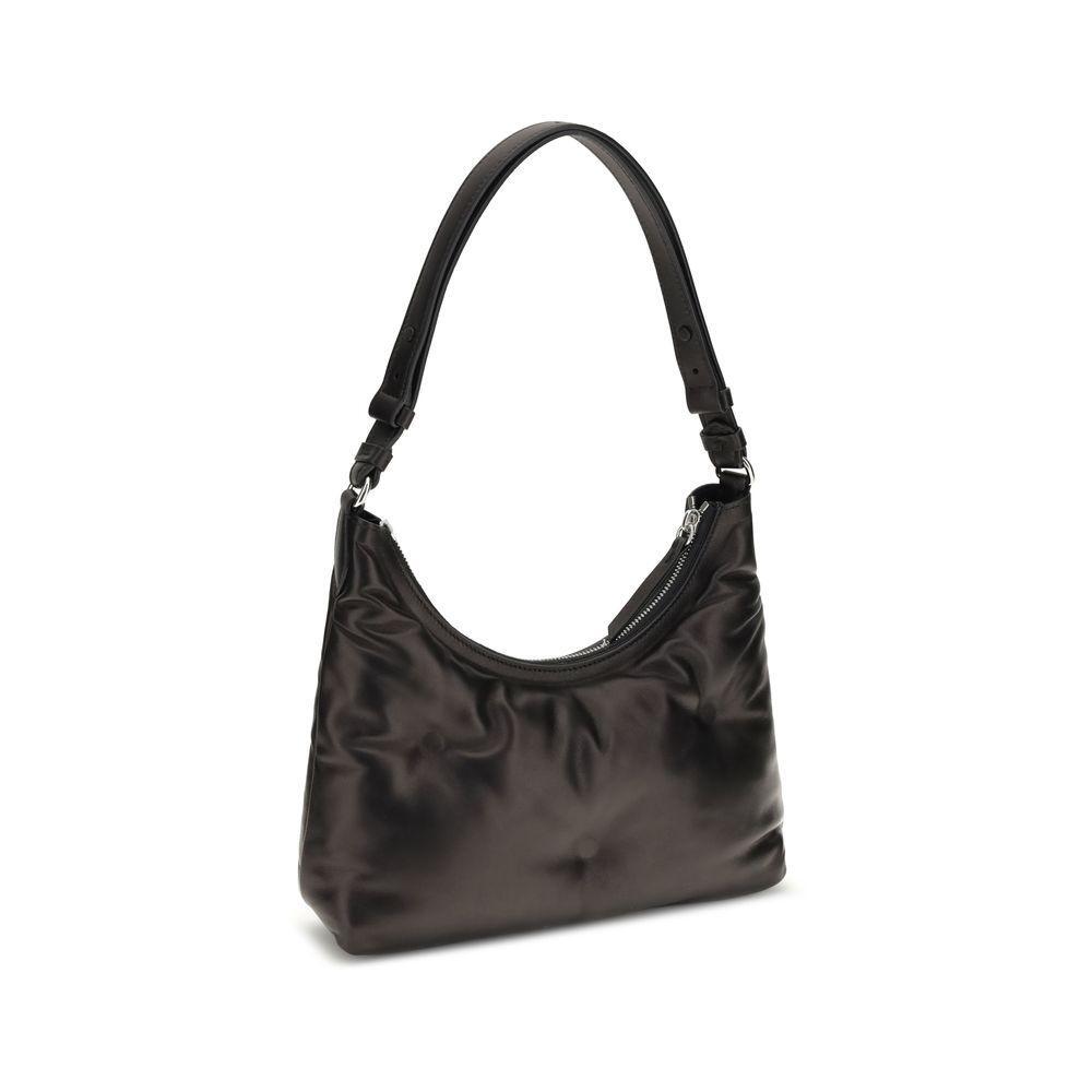 Front view with bag zipped and handles upright.
