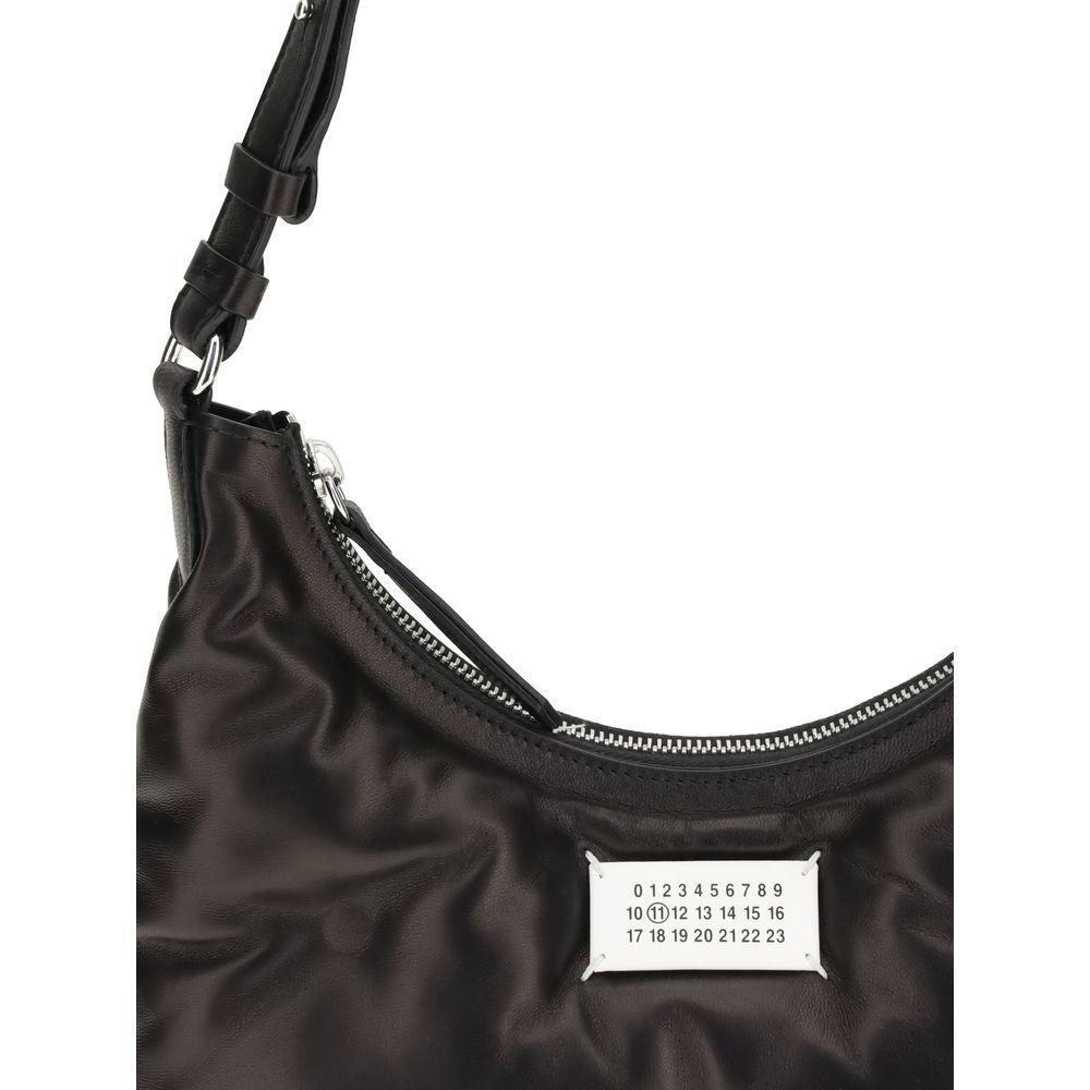 Front view with bag zipped and handles upright.