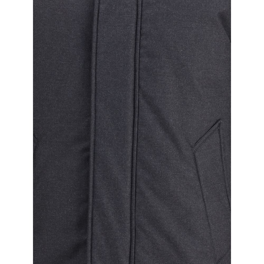 Close-up of Woolrich Black Fleece Wool Parka with side welt pocket and buttoned flap closure, ideal for style and warmth in winter.