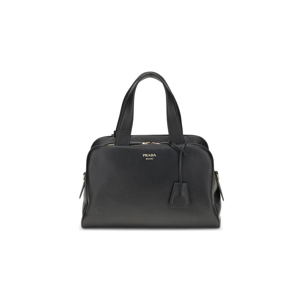 Front view with bag zipped and handles upright.