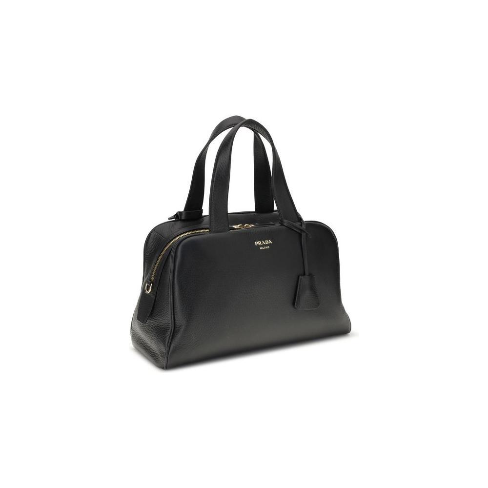 Front view with bag zipped and handles upright.
