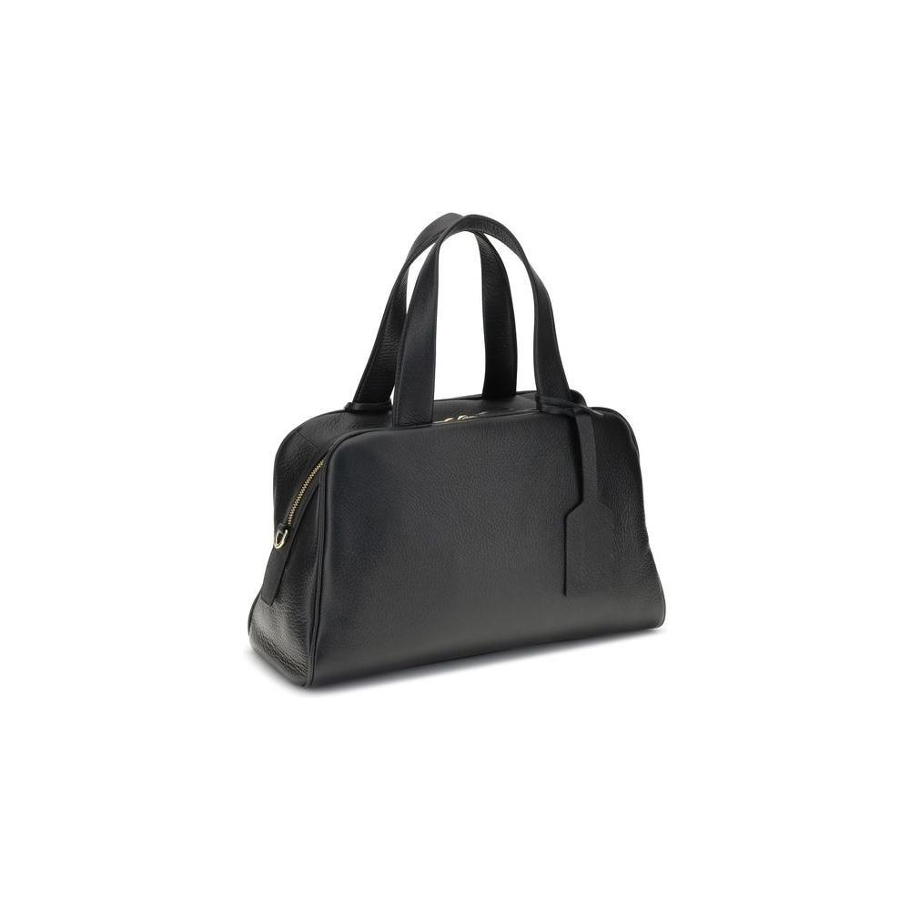 Front view with bag zipped and handles upright.