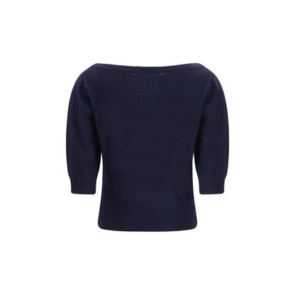 Extreme Cashmere Blue Cashmere Cashmere Sweater with crew neck, short sleeves, and ribbed hemline, designed for minimal elegance.