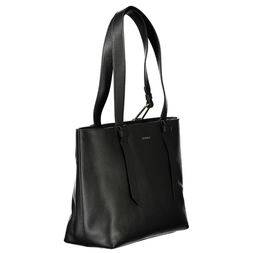 Front view with bag zipped and handles upright.