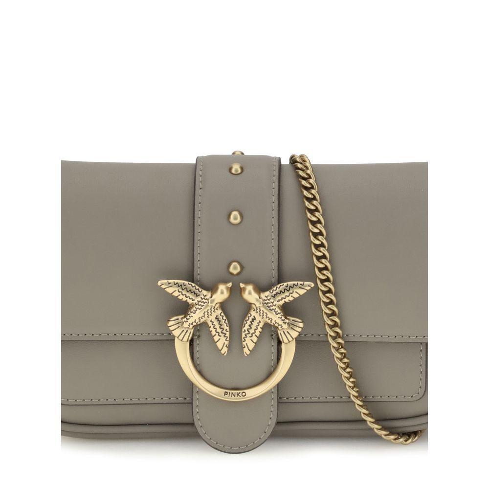 Front view with bag zipped and handles upright.