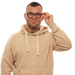 A person wearing Longines Black Unisex Glasses Frame with a beige hoodie, showcasing the round black full-rim design.