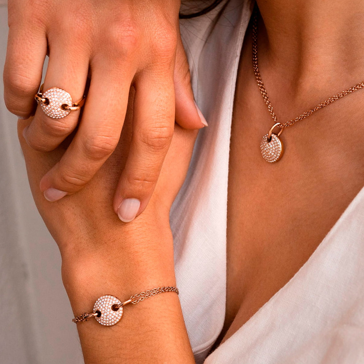 Elegant jewelry set by AN JEWELS JEWELRY Mod. AL.BJT01RC with matching necklace, bracelet, and ring in a classic design.