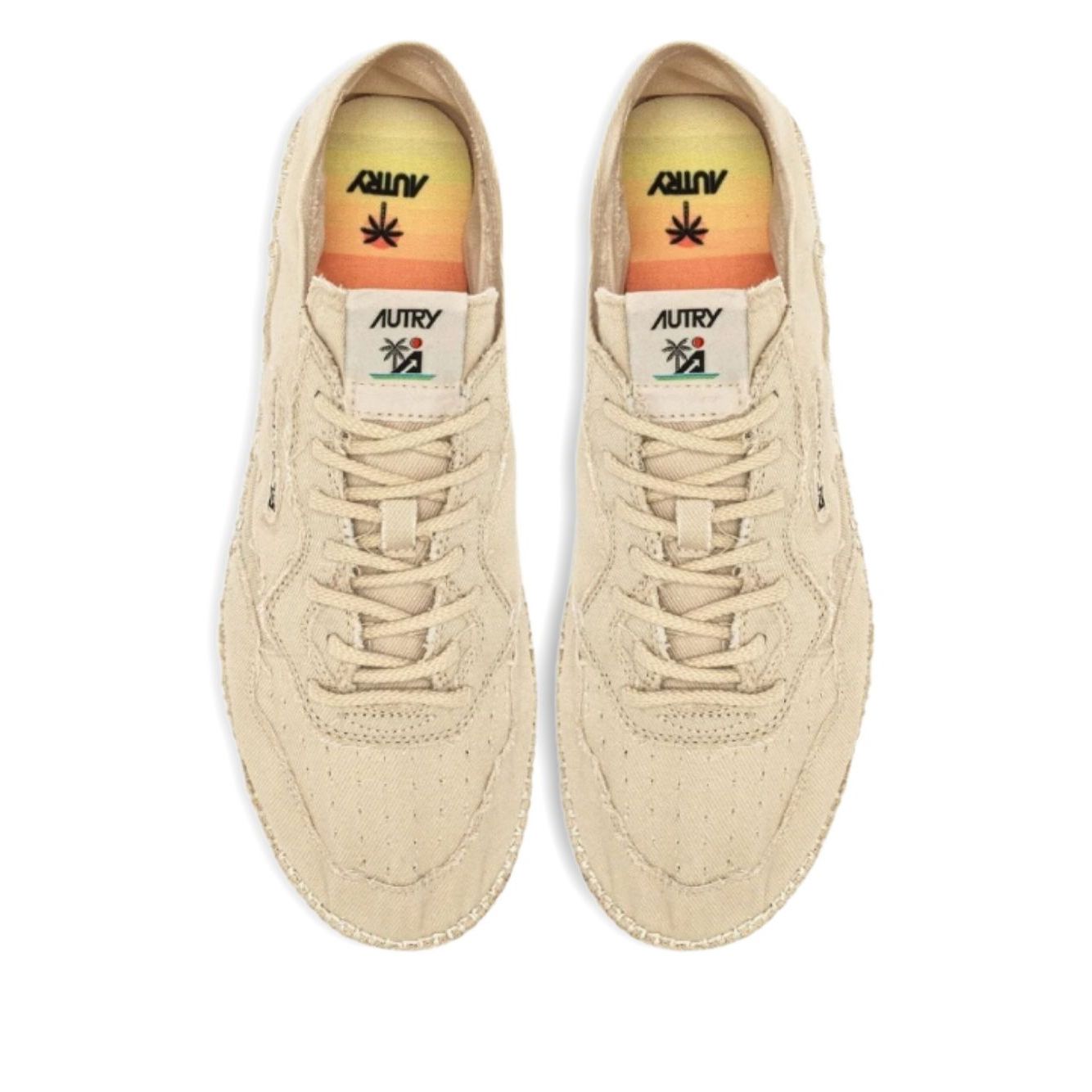 Top view of AUTRY Sneakers Ivory with canvas upper, lace-up design, and beige jute sole, featuring logo patch and tonal stitching.