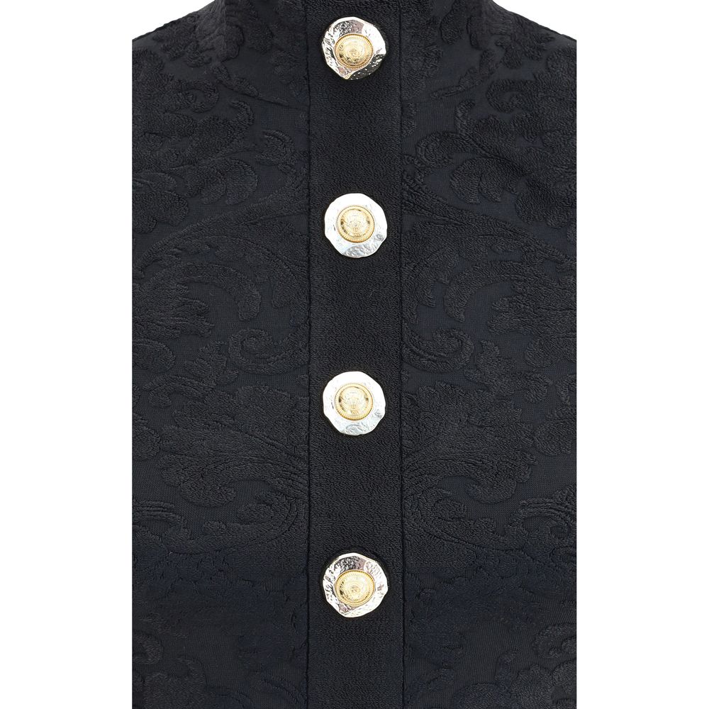 Close-up of Balmain Black Viscose Top with baroque pattern and decorative gold buttons, showing the detailed craftsmanship and design.