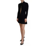 Model wearing Dsquared² Black Viscose Long Sleeves Cut Out Mini Dress, sheath design with zipper closure, showcasing elegant fashion.