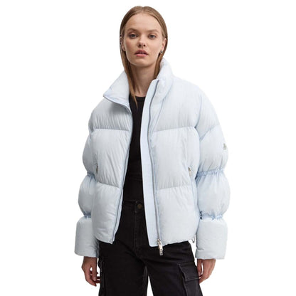 Moose Knuckles Light Blue Nylon Women Jacket with down padding and zip fastening. Perfect for cold city days and après-ski elegance.