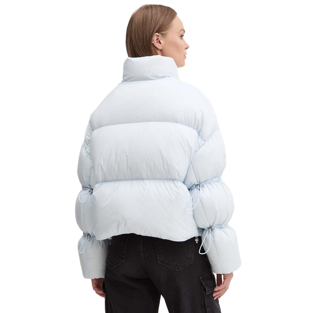 Moose Knuckles Light Blue Nylon Women Jacket with down padding, showcased from the back view, highlighting style and drawstring details.