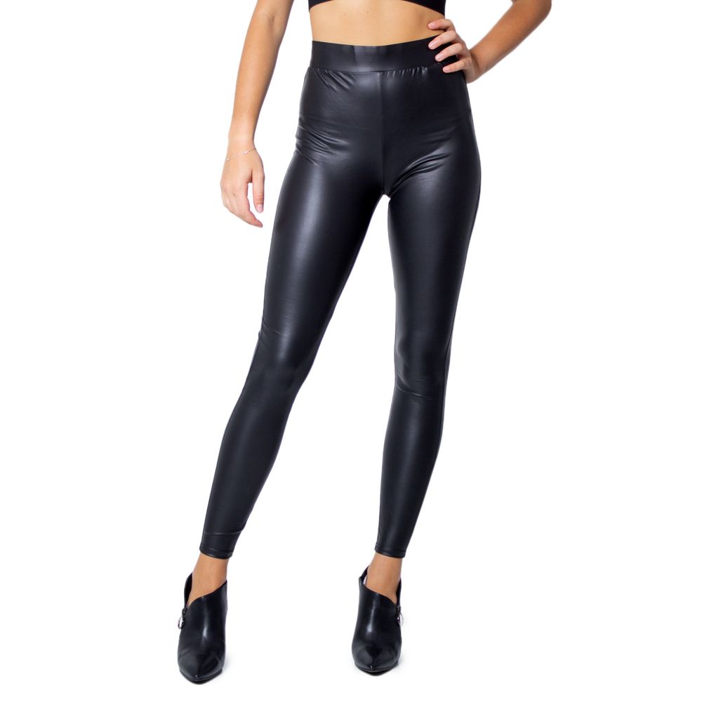 Model wearing Only Black Polyester Leggings with glossy finish, perfect for casual or elegant occasions.