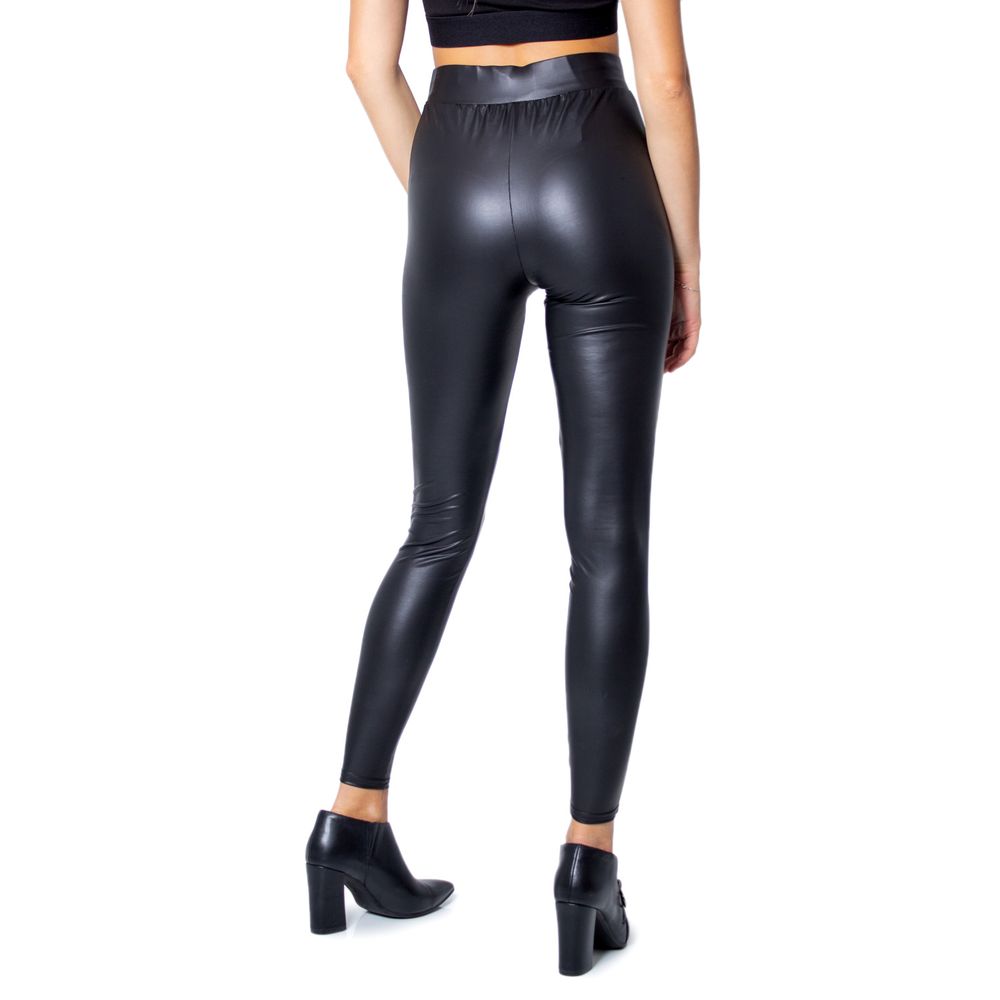 Woman wearing Only Black Polyester Leggings with glossy finish, perfect for elegant and casual occasions.