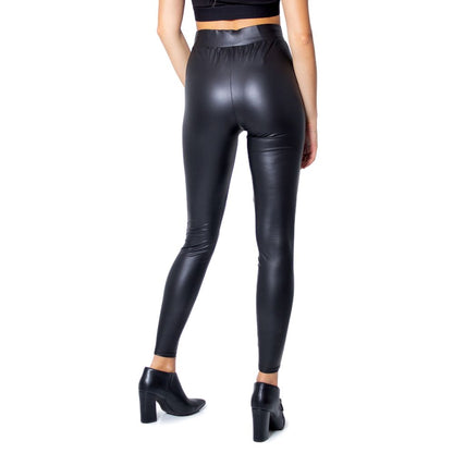 Woman wearing Only Black Polyester Leggings with glossy finish, perfect for elegant and casual occasions.