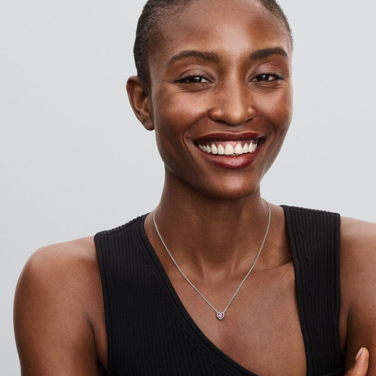 Smiling woman wearing PANDORA JEWELRY Mod. 398425C02-45 necklace