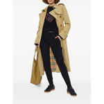 PS By Paul Smith Sweaters Black with heart embroidery, ribbed neckline, and relaxed fit, shown with trench coat and casual pants outfit.
