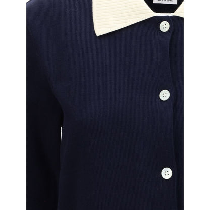 Close-up of Thom Browne Blue Cotton Casual Dress showcasing ribbed knit texture and button closure with polo-style collar.
