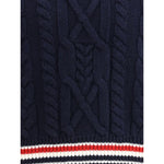 Thom Browne Cable knit Sweater with tricolor hem details showcasing elegant and contemporary style.