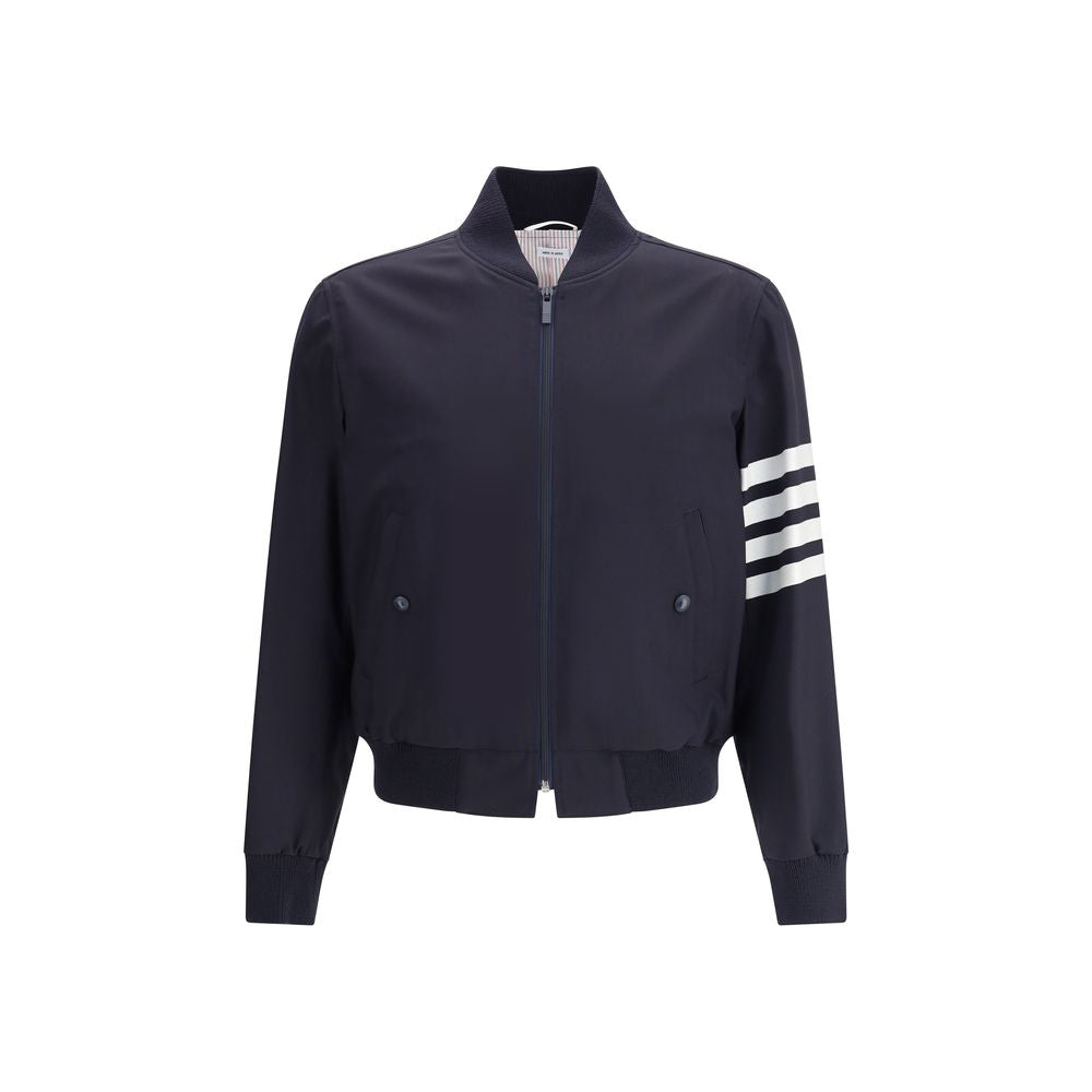 Thom Browne Wool Jacket with ribbed collar, front zipper, pockets, ribbed cuffs, and signature horizontal arm band.