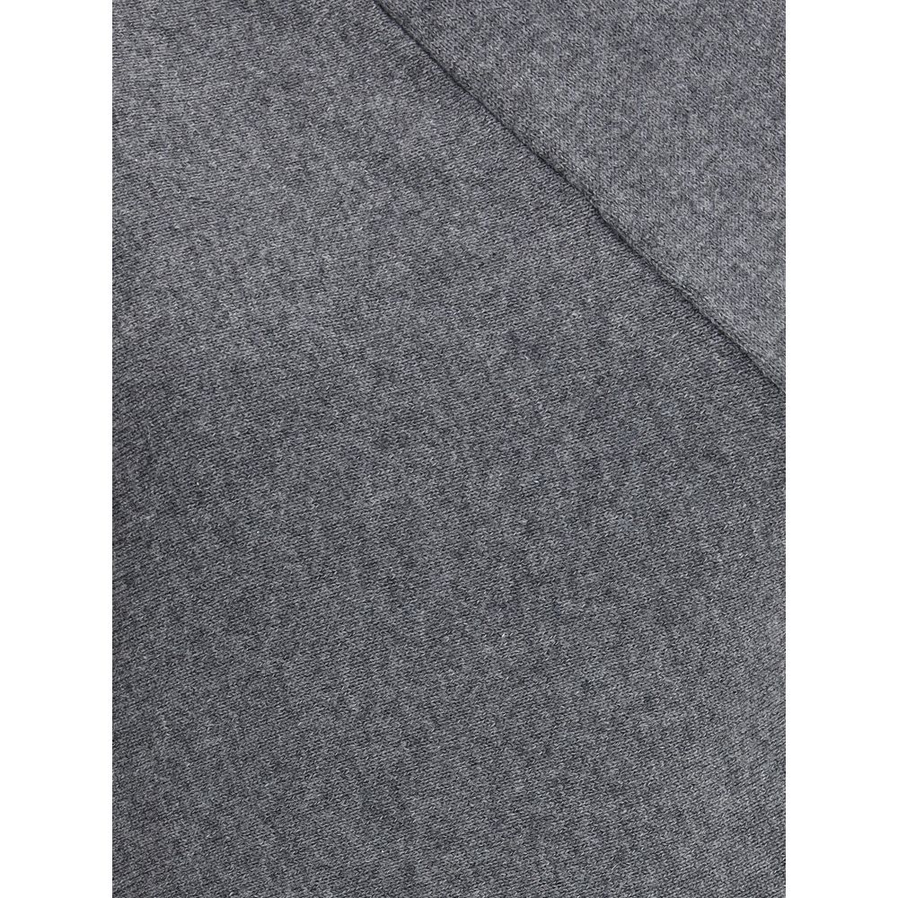 Close-up of fabric texture of Tom Ford Gray Cashmere Turtleneck showing luxurious, soft knit material.