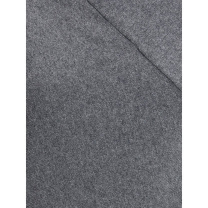 Close-up of fabric texture of Tom Ford Gray Cashmere Turtleneck showing luxurious, soft knit material.