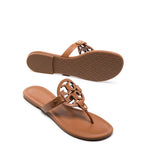 Brown leather Tory Burch Miller Sandals with branded insole, thong strap, slip-on style, flat rubber sole, and laser-cut Double T logo.