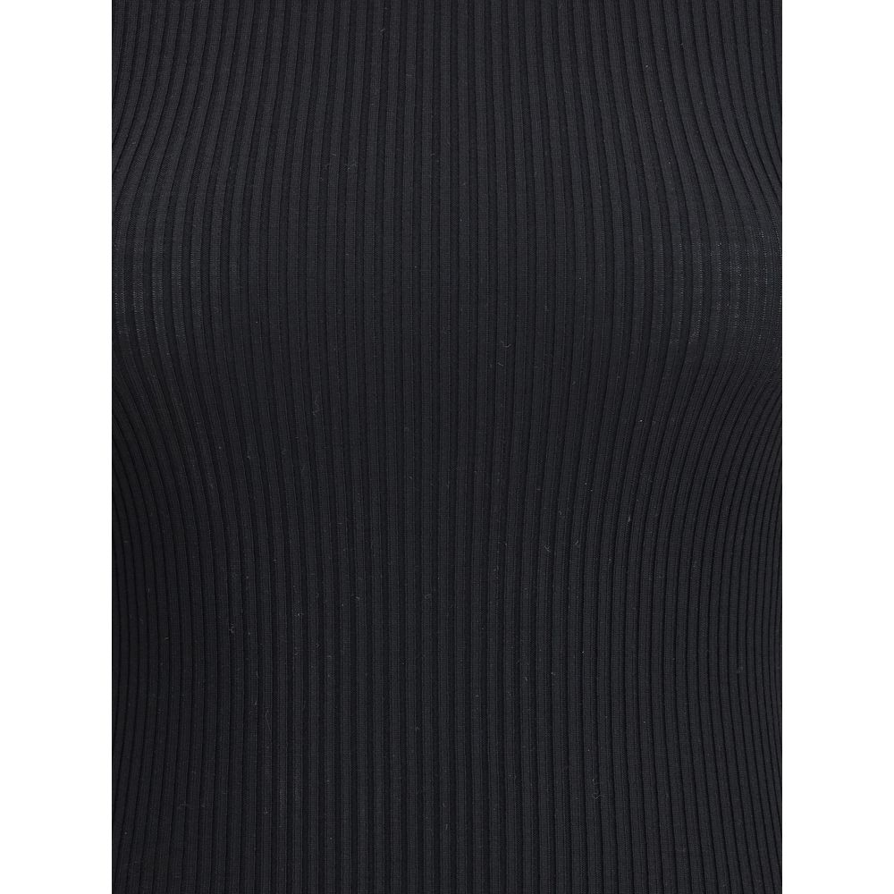 Close-up of the ribbed texture on Wolford Black Fleece Wool Turtleneck, showcasing high-quality virgin wool material and slim fit design.