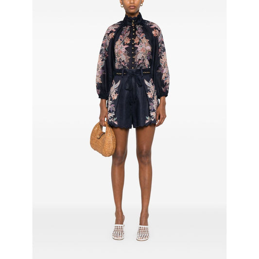 Zimmermann Rhiannon Billow blouse in navy with paisley print, front button fastening, long sleeves, elasticated cuffs, worn by model.